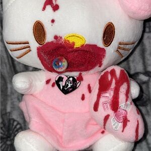 Pink and White Plush Toy with Heart Pin